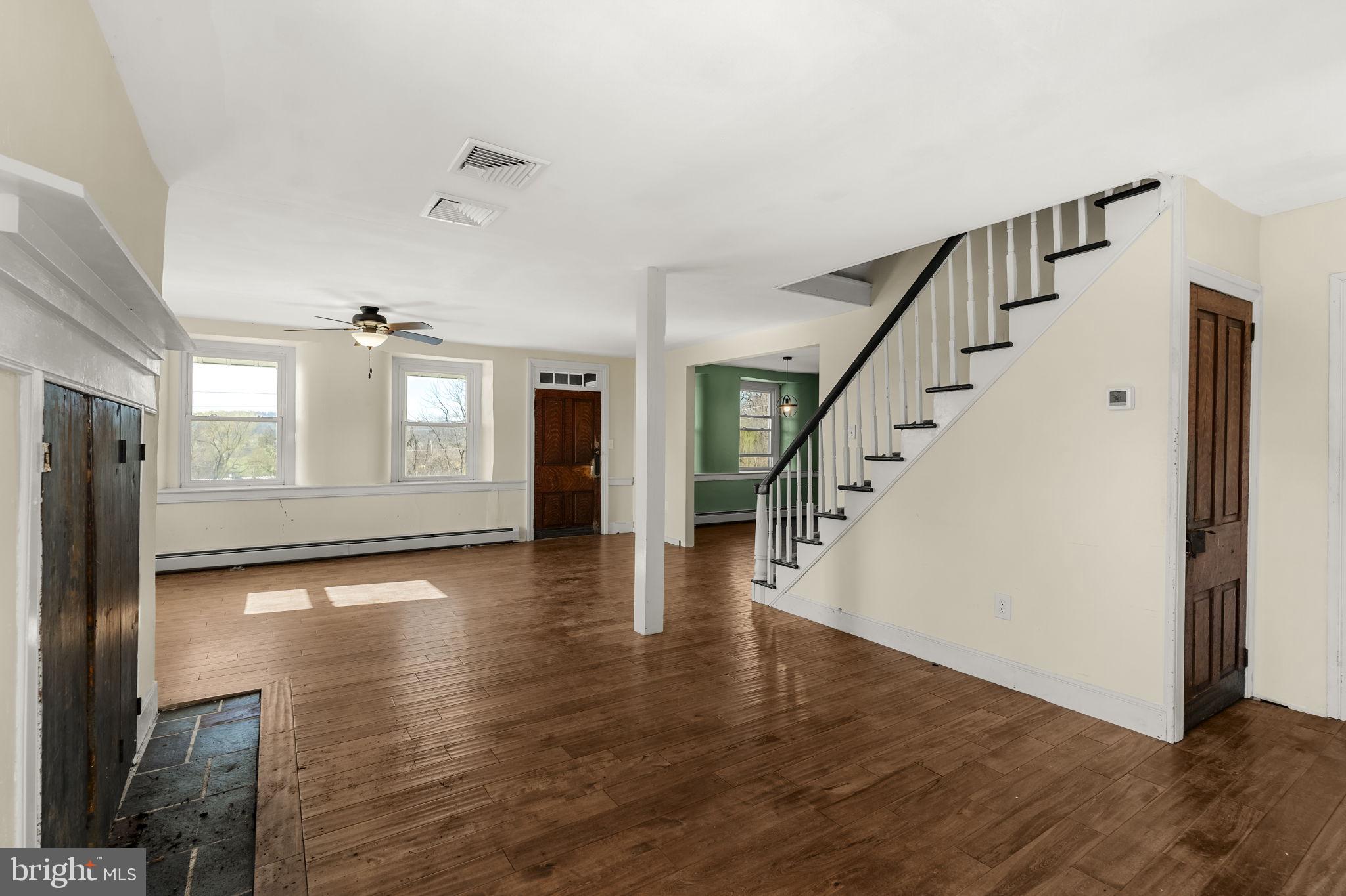 39 Gill Road Mohnton, PA 19540 - Photo 10 of 59 a view of empty room with wooden floor and fan