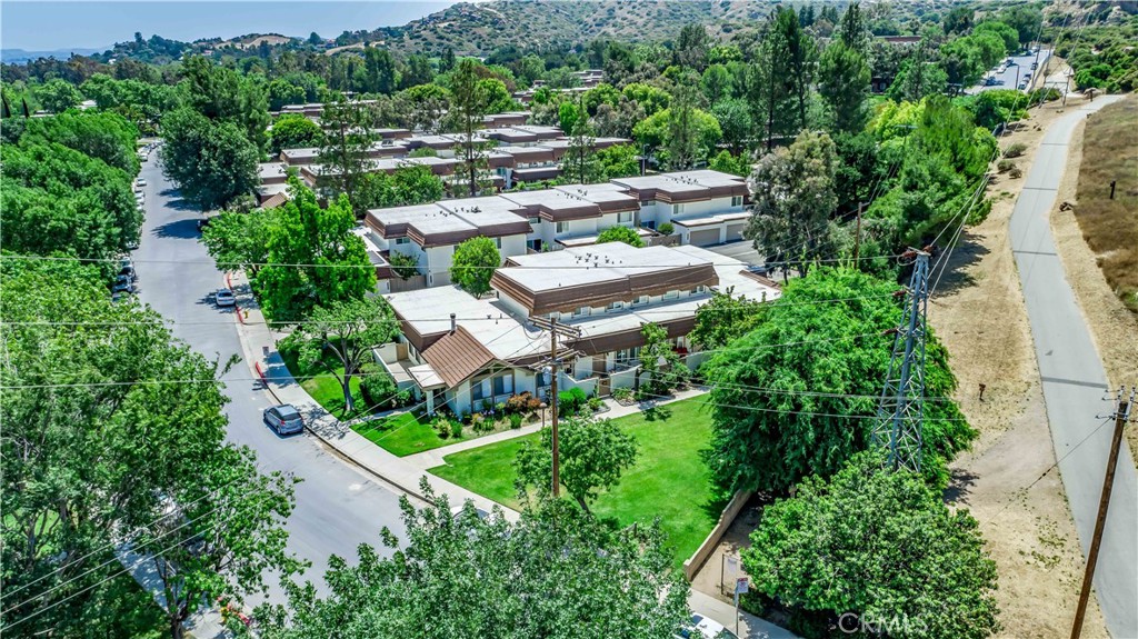10215 Larwin Avenue, Unit 4 Chatsworth, CA 91311 - Photo 36 of 38 an aerial view of residential house with outdoor space and trees all around