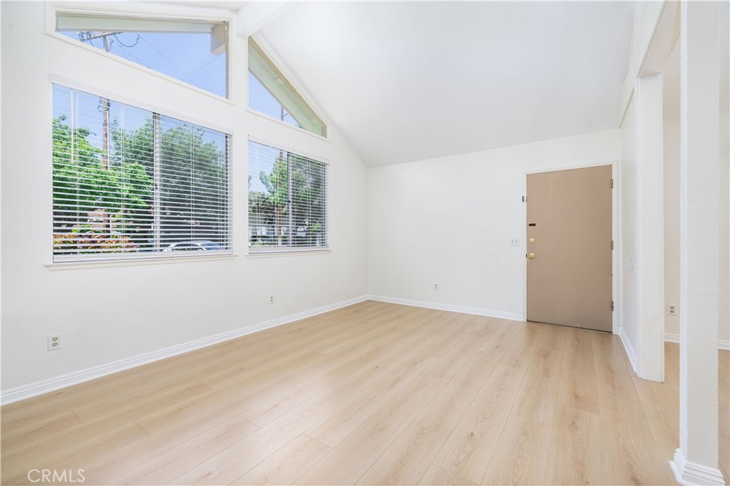10215 Larwin Avenue, Unit 4 Chatsworth, CA 91311 - Photo 7 of 38 a view of an empty room with a window
