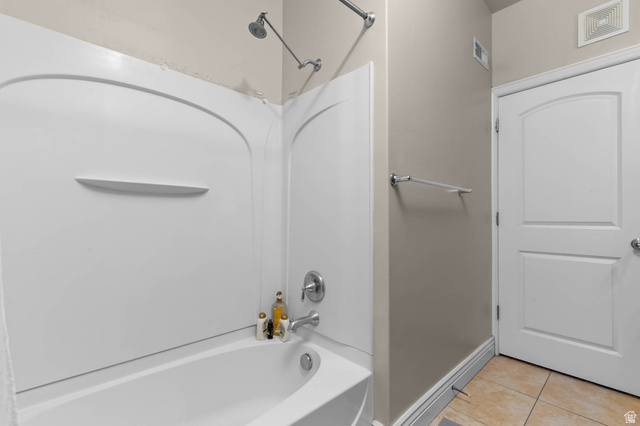 476 West 200 N Street, Unit 206 Springville, UT 84663 - Photo 17 of 24 Full bathroom with washtub / shower combination and light tile patterned floors