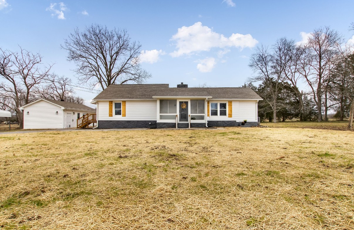 679 Alsup Mill Road Lebanon, TN 37090 - Photo 3 of 26 a front view of house with yard and trees