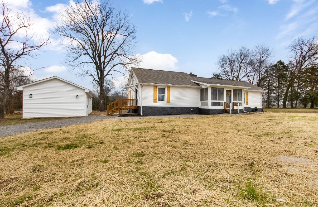 679 Alsup Mill Road Lebanon, TN 37090 - Photo 5 of 26 a house with trees in the background