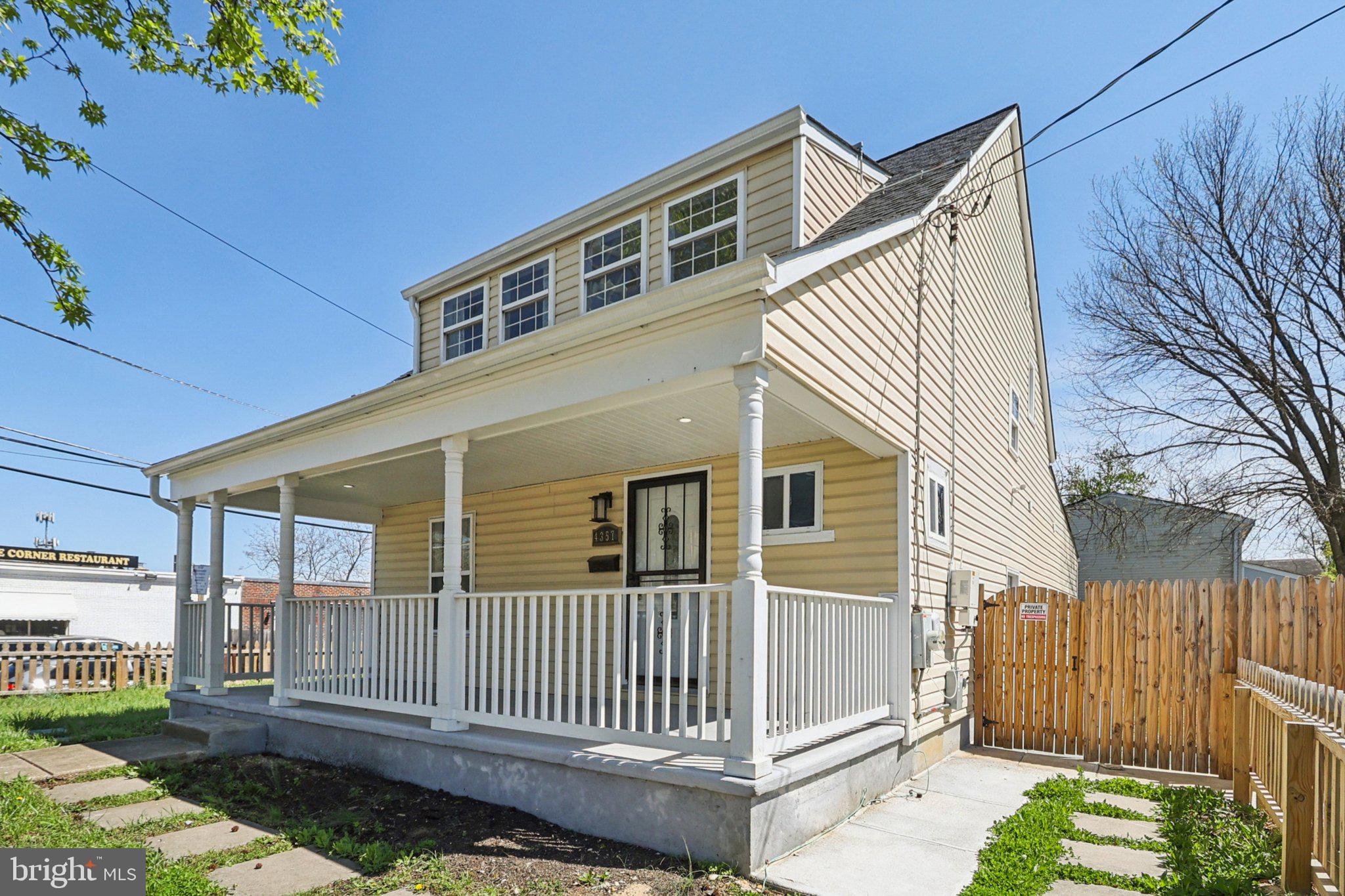 a front view of a house with a porch