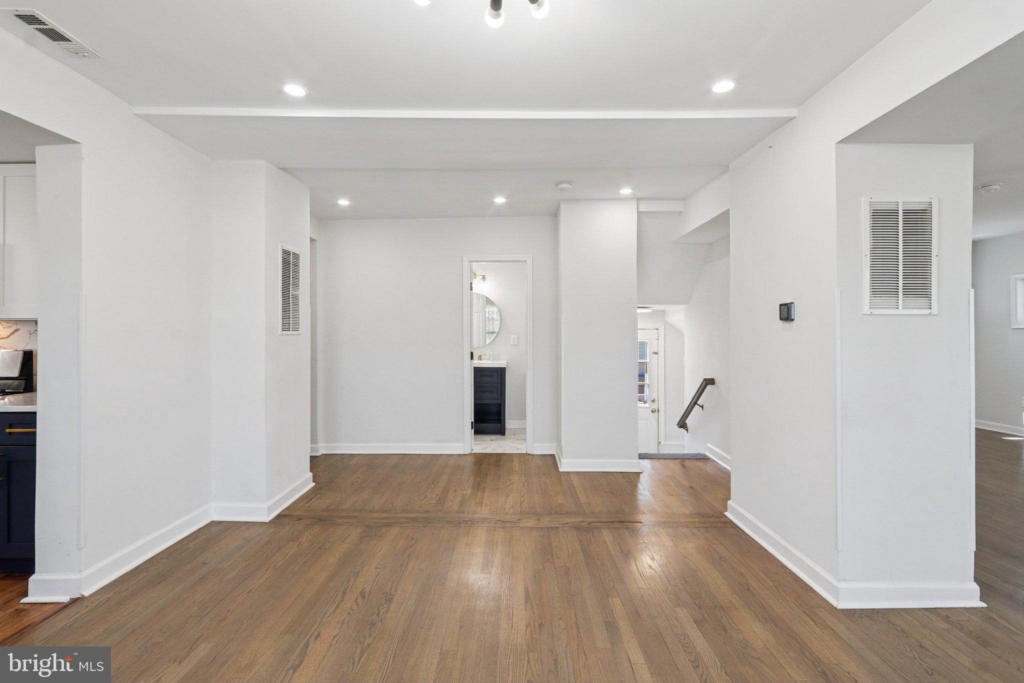 4357 Southern Avenue Southeast Capitol Heights, MD 20743 - Photo 21 of 84 a view of a hallway with wooden floor