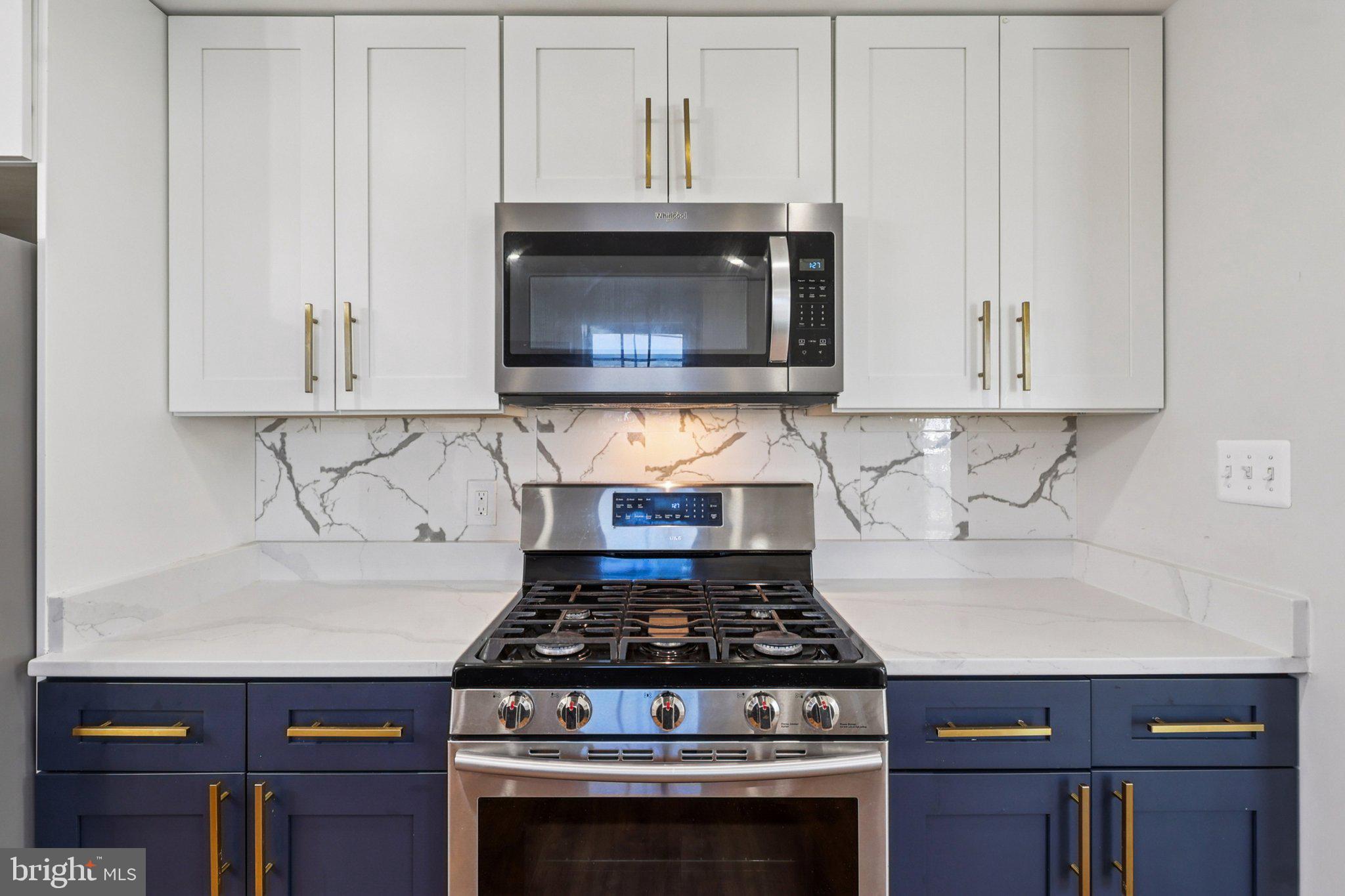 4357 Southern Avenue Southeast Capitol Heights, MD 20743 - Photo 25 of 84 a stove top oven sitting inside of a kitchen