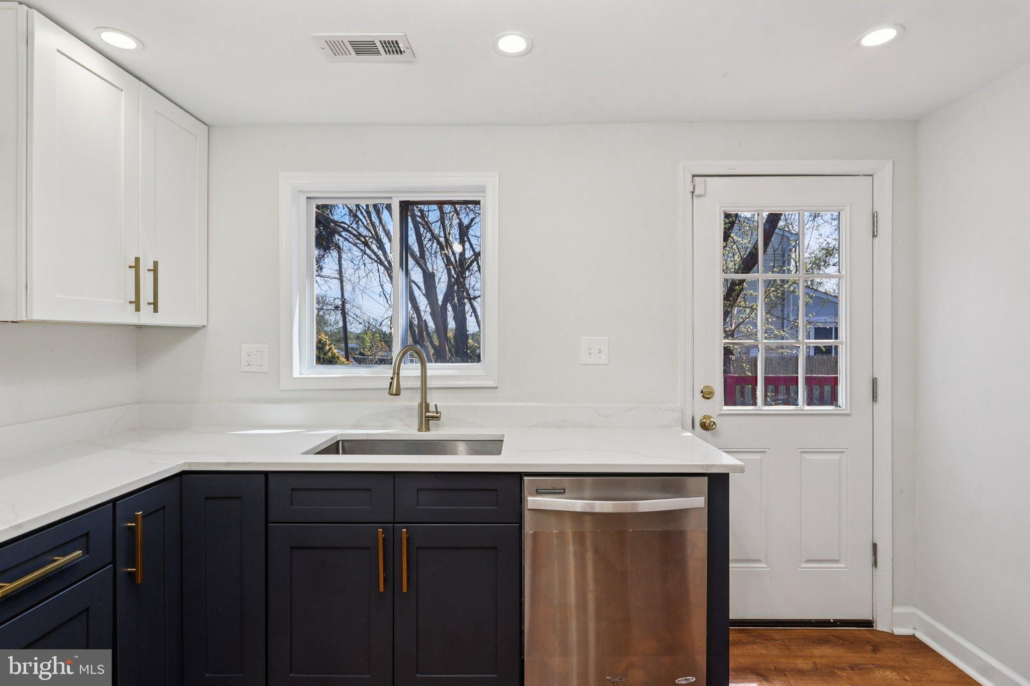 4357 Southern Avenue Southeast Capitol Heights, MD 20743 - Photo 26 of 84 a kitchen with a sink and cabinets