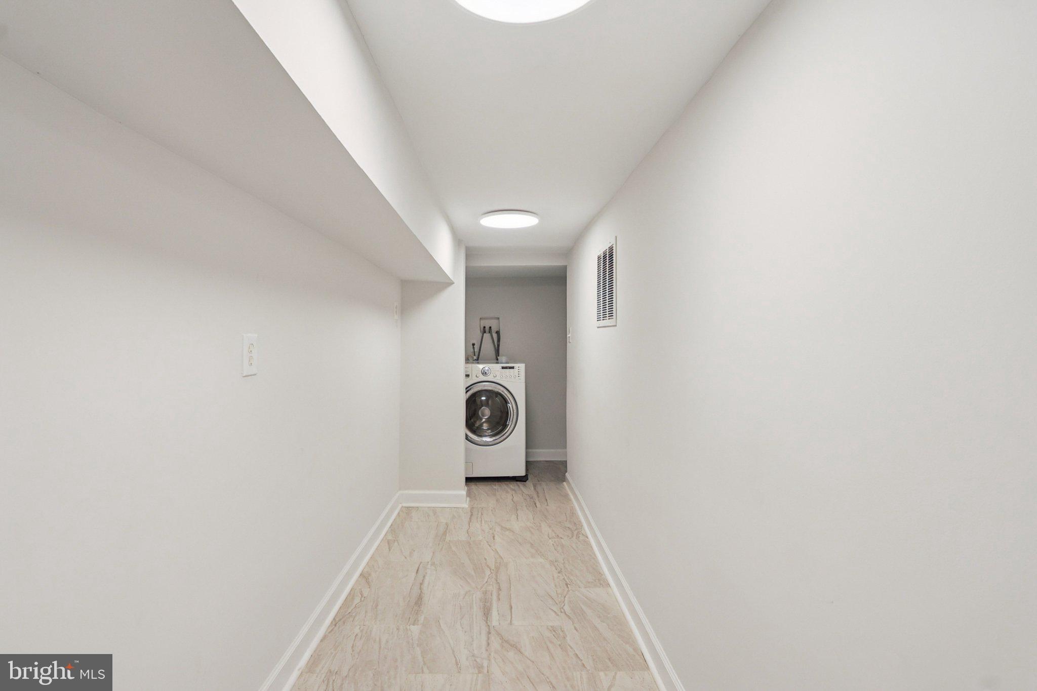 4357 Southern Avenue Southeast Capitol Heights, MD 20743 - Photo 47 of 84 a view of a hallway with a white walls