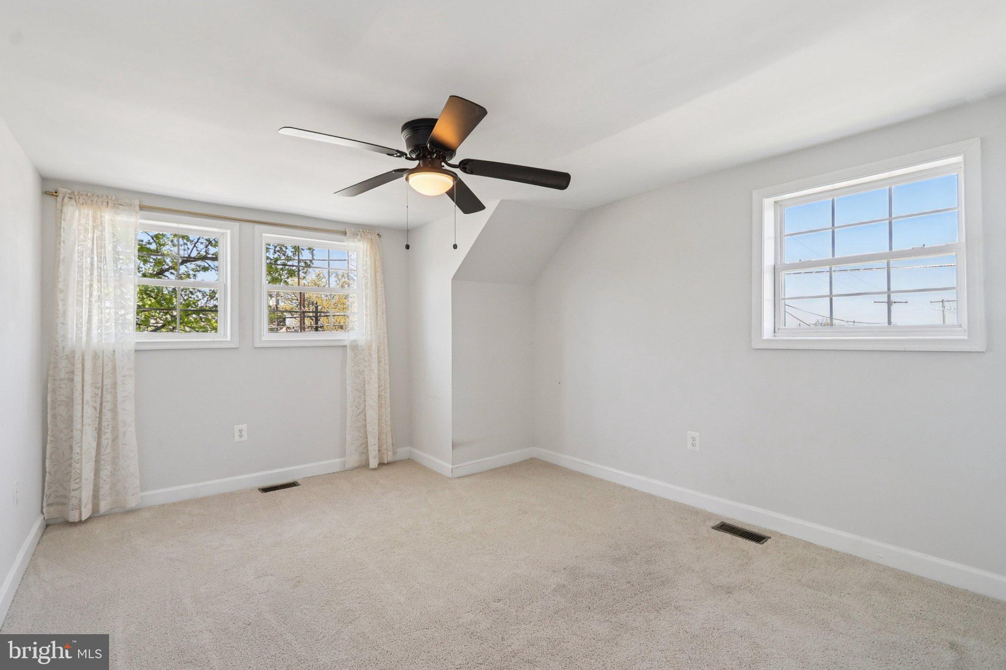 4357 Southern Avenue Southeast Capitol Heights, MD 20743 - Photo 58 of 84 an empty room with windows and fan