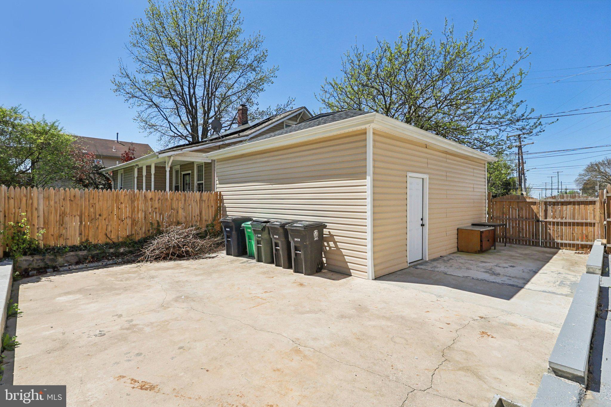 4357 Southern Avenue Southeast Capitol Heights, MD 20743 - Photo 73 of 84 a view of a house with a yard and wooden fence