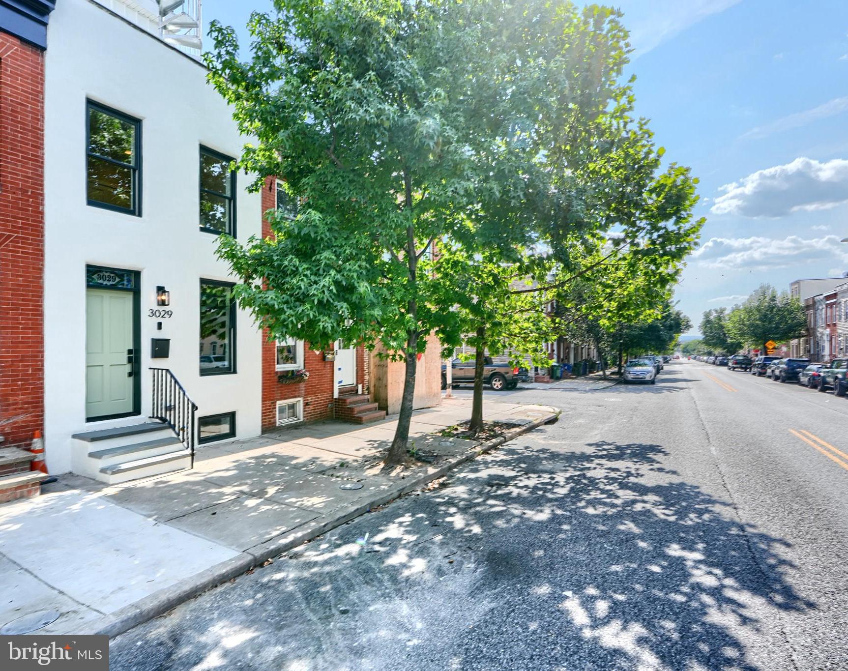 3029 Hudson Street Baltimore, MD 21224 - Photo 2 of 52 a house with trees in front of it