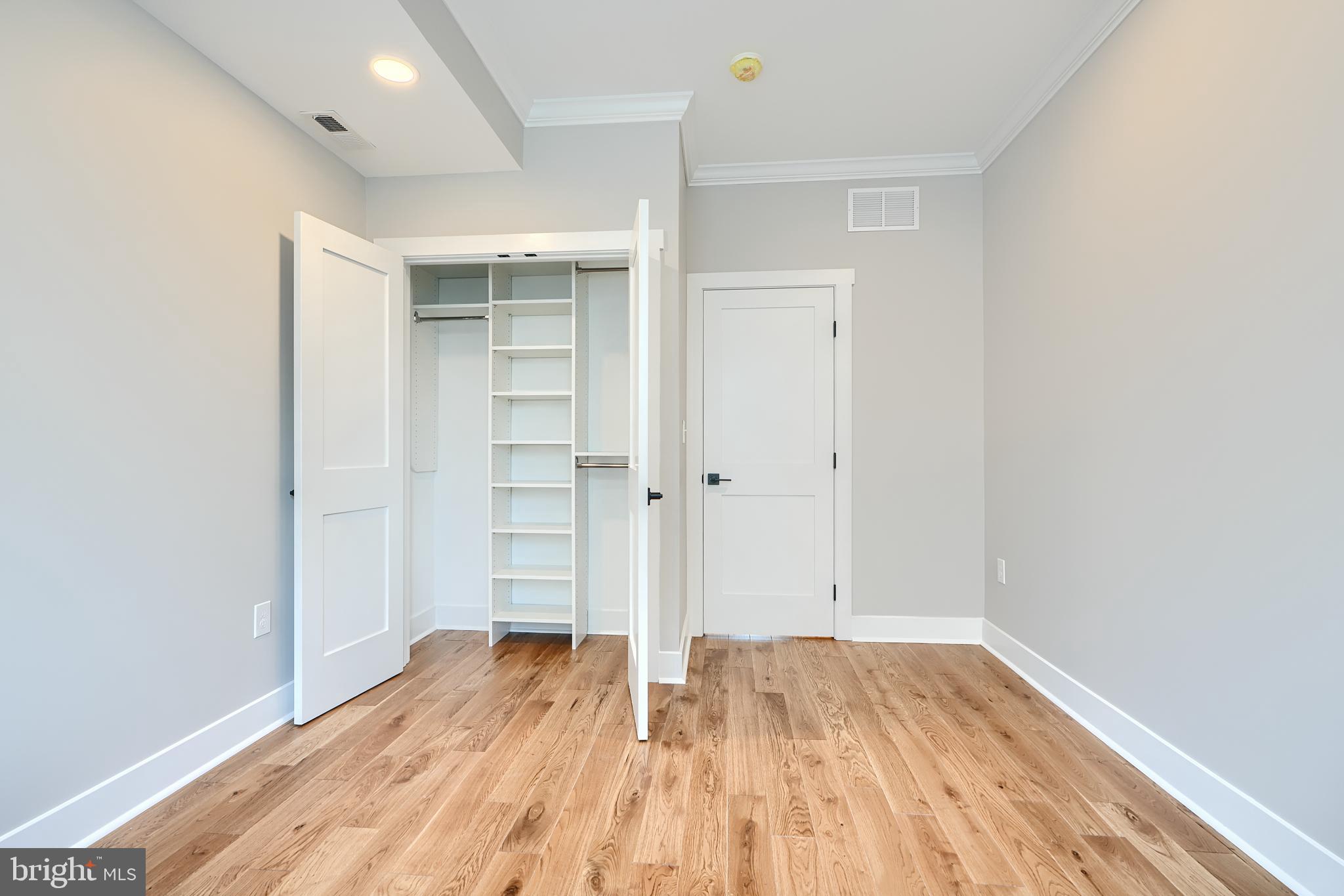 3029 Hudson Street Baltimore, MD 21224 - Photo 26 of 52 wooden floor in an empty room