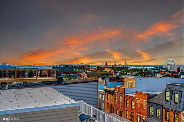 a view of a balcony with city view