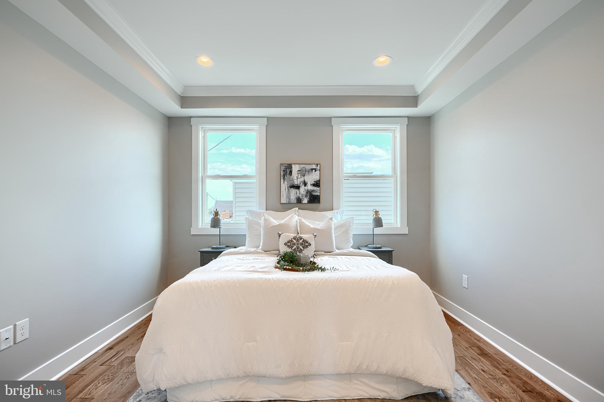 3029 Hudson Street Baltimore, MD 21224 - Photo 32 of 52 a bedroom with a bed and window