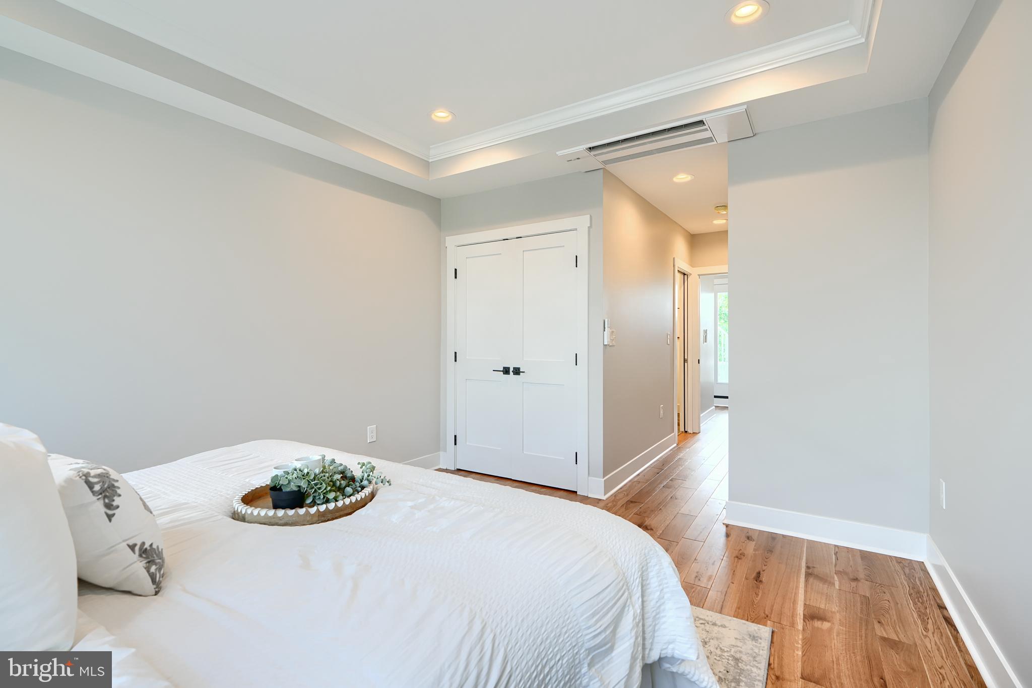 3029 Hudson Street Baltimore, MD 21224 - Photo 33 of 52 a bedroom with a bed and a sink