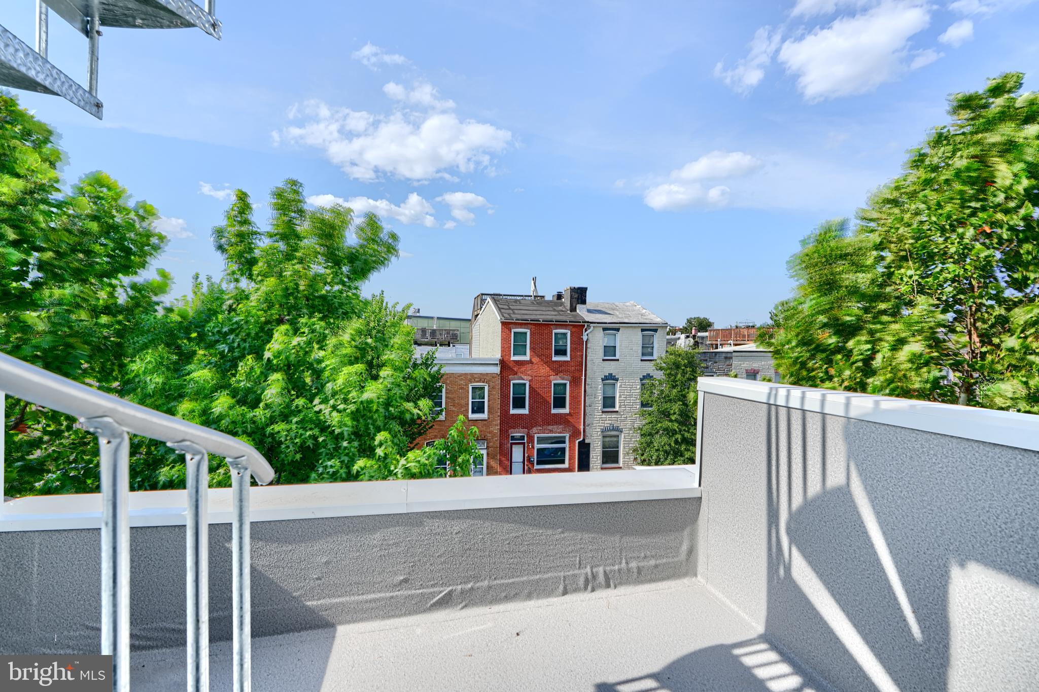 3029 Hudson Street Baltimore, MD 21224 - Photo 35 of 52 a view of a building from a backyard