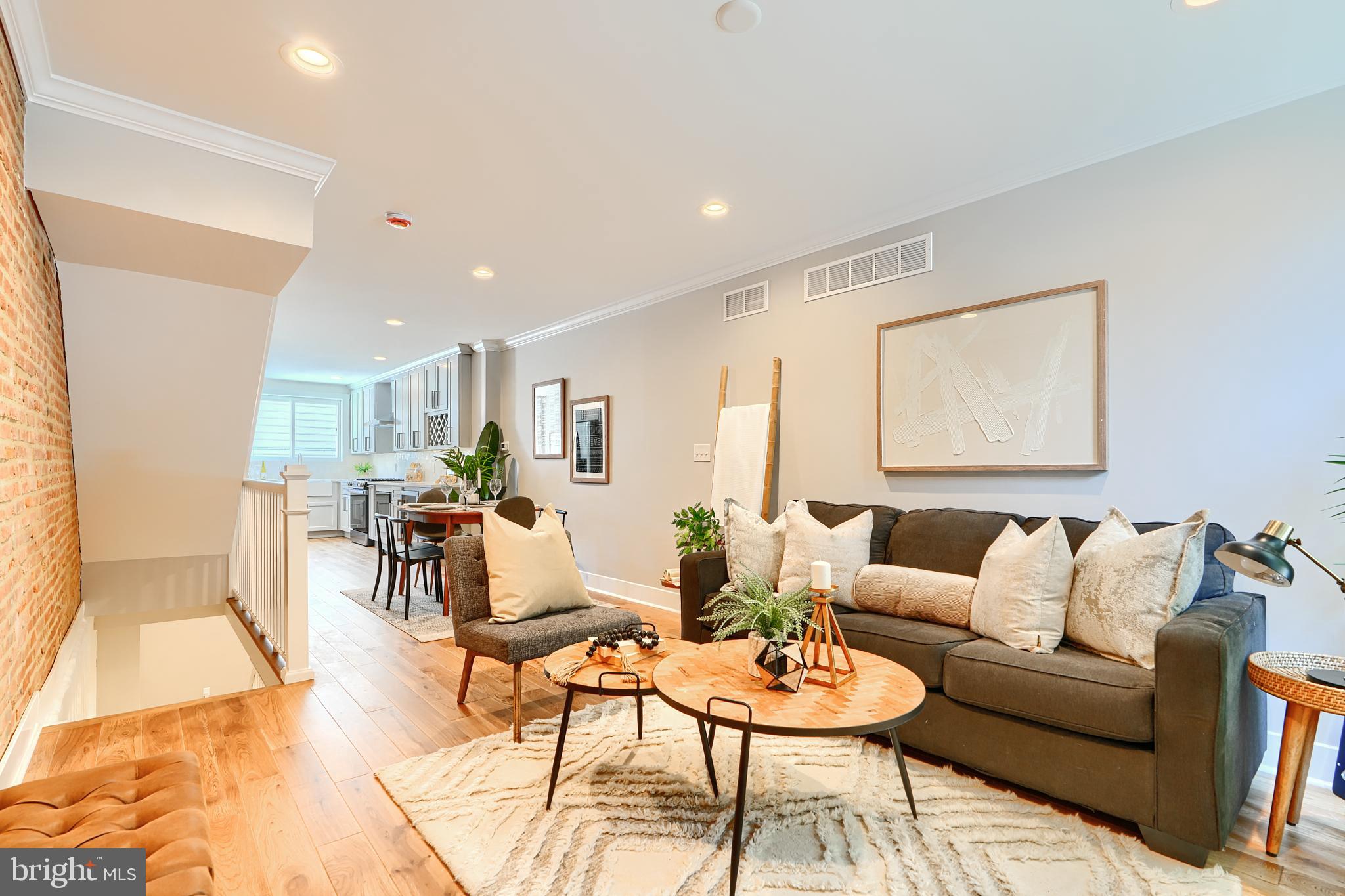 3029 Hudson Street Baltimore, MD 21224 - Photo 4 of 52 a living room with furniture and a table
