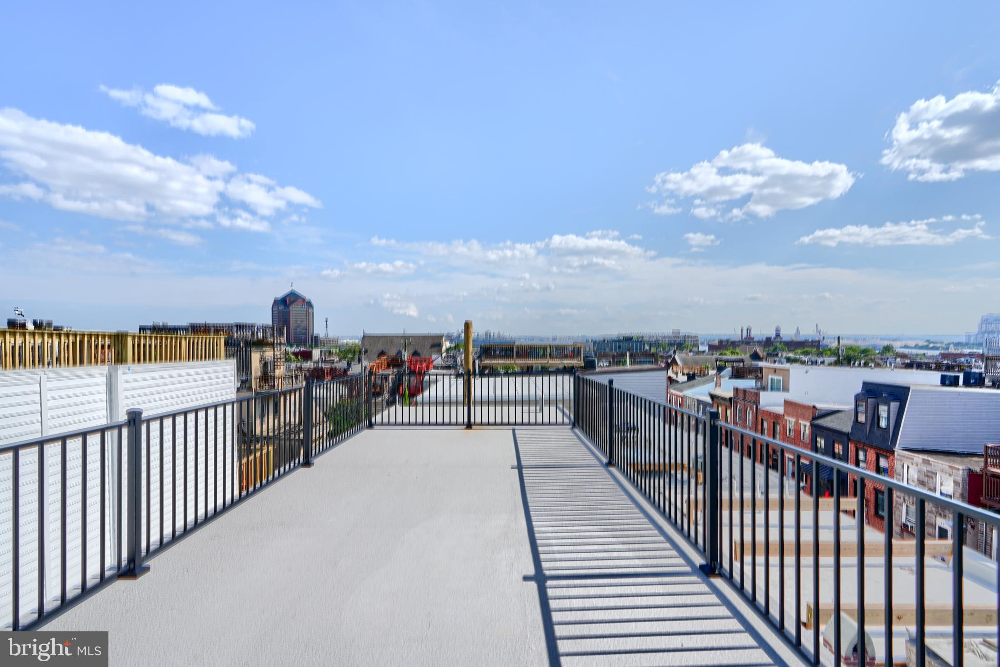 3029 Hudson Street Baltimore, MD 21224 - Photo 38 of 52 a view of a balcony with city view