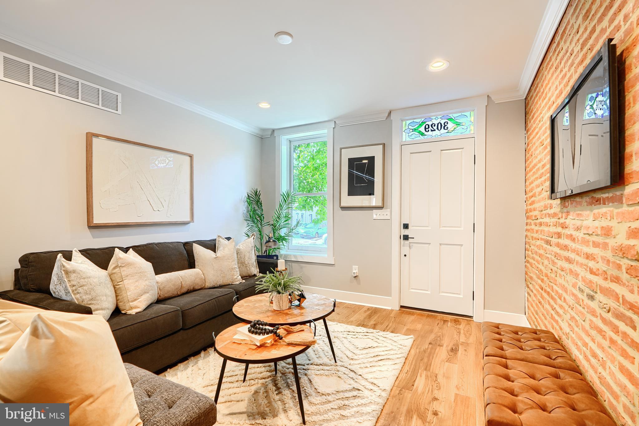 3029 Hudson Street Baltimore, MD 21224 - Photo 7 of 52 a living room with furniture and a rug