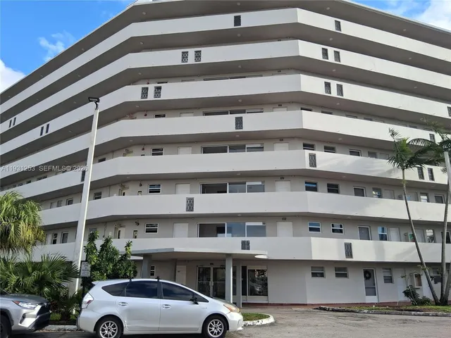a car parked in front of a building