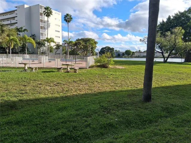 a view of a garden with houses