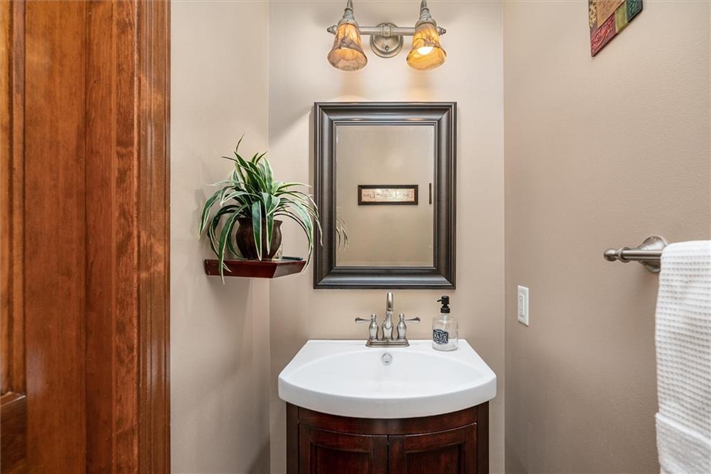 463 Myoma Road Mars, PA 16046 - Photo 13 of 35 a bathroom with a sink a mirror and vanity