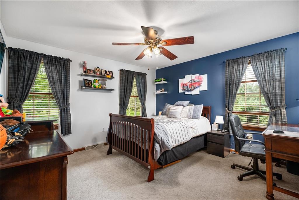 463 Myoma Road Mars, PA 16046 - Photo 17 of 35 a bed room with a bed and a window