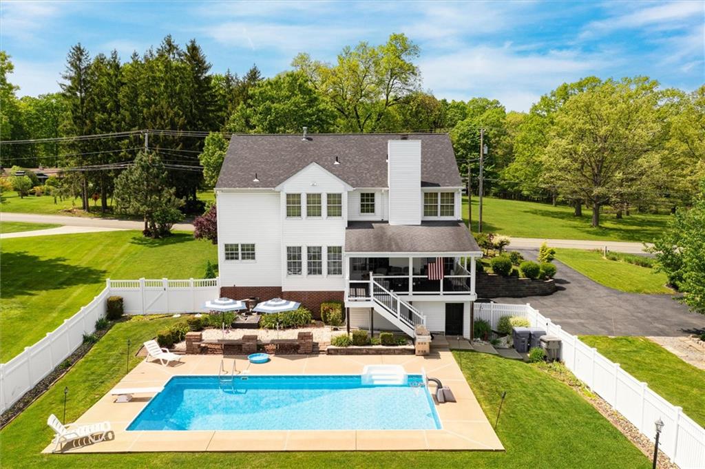 463 Myoma Road Mars, PA 16046 - Photo 27 of 35 a view of a house with pool and a yard