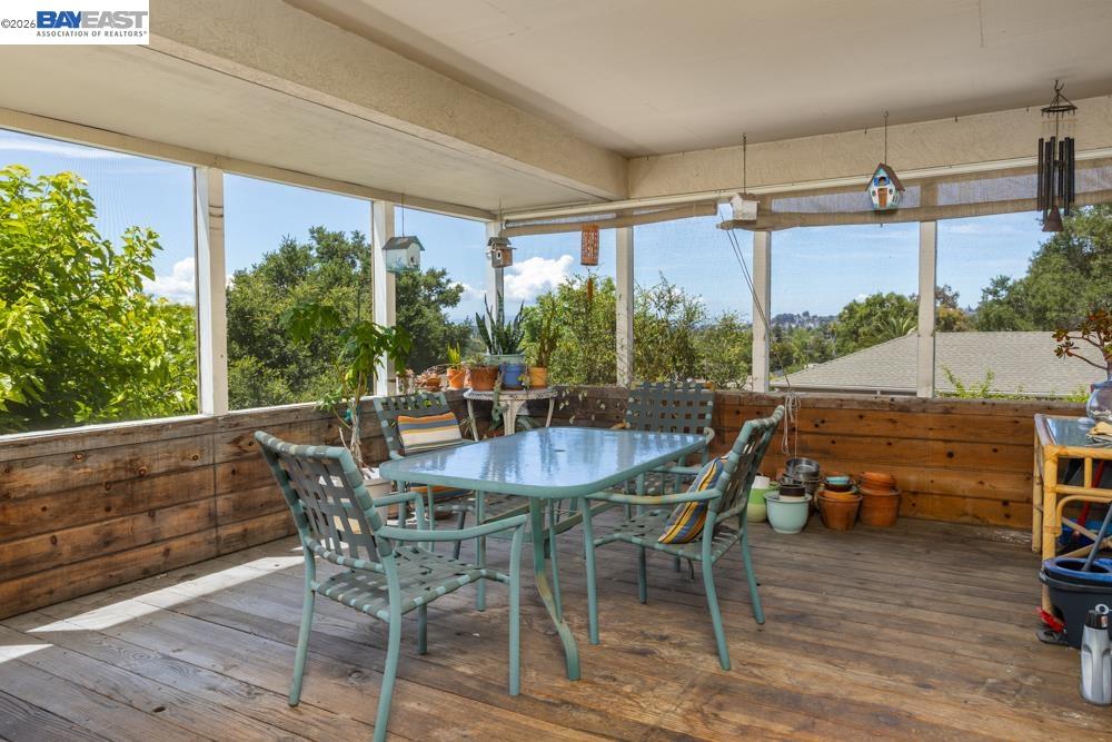 4591 Edwards Lane Castro Valley, CA 94546 - Photo 23 of 44 a dining area with furniture and outdoor space