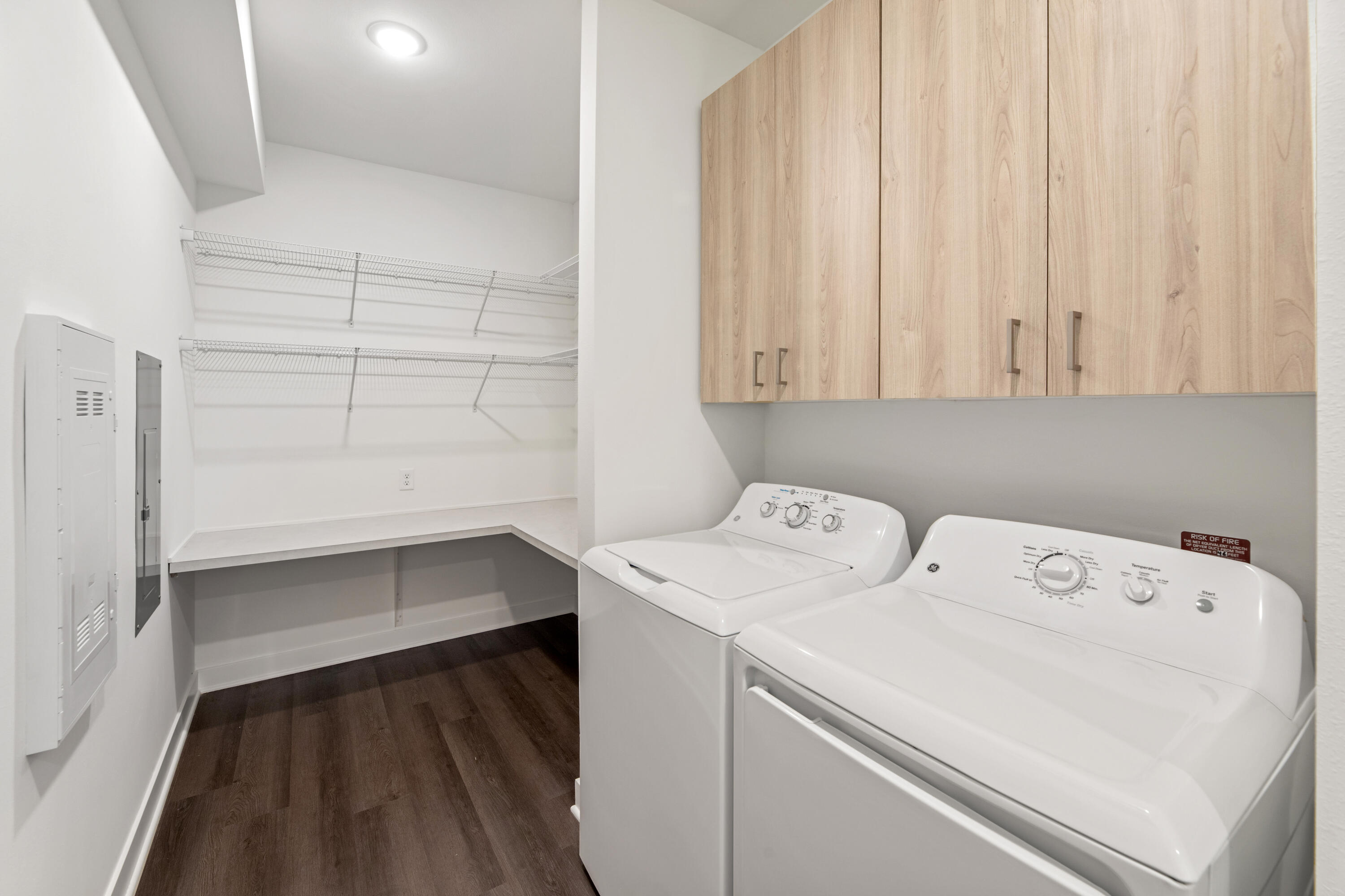 1818 West Mildenhall Drive, Unit 1902 Oak Creek, WI 53154 - Photo 16 of 36 Heyday Hub- Full-size, side-by-side washer and dryer; built-in desk top