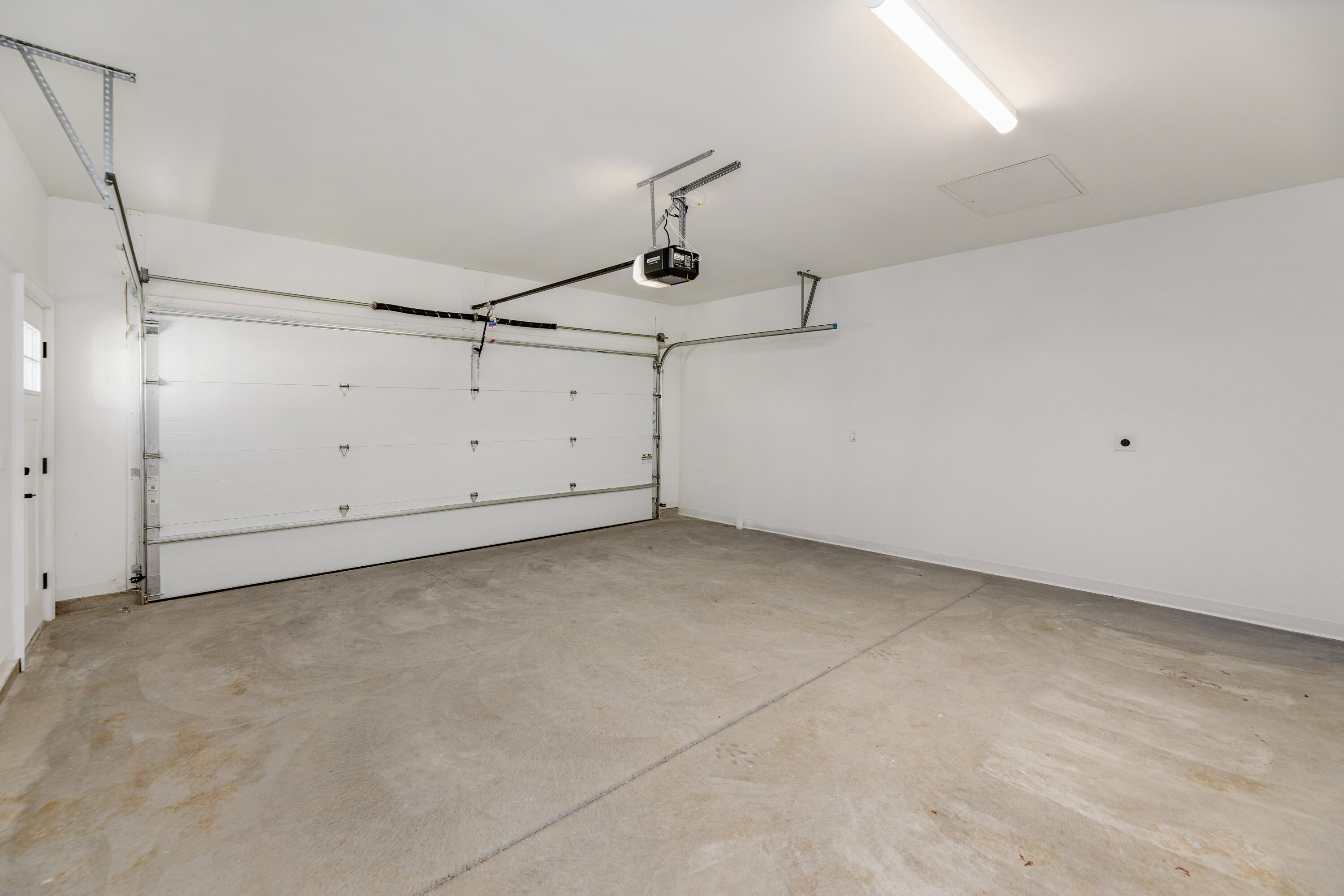 1818 West Mildenhall Drive, Unit 1902 Oak Creek, WI 53154 - Photo 17 of 36 2- car attached garage