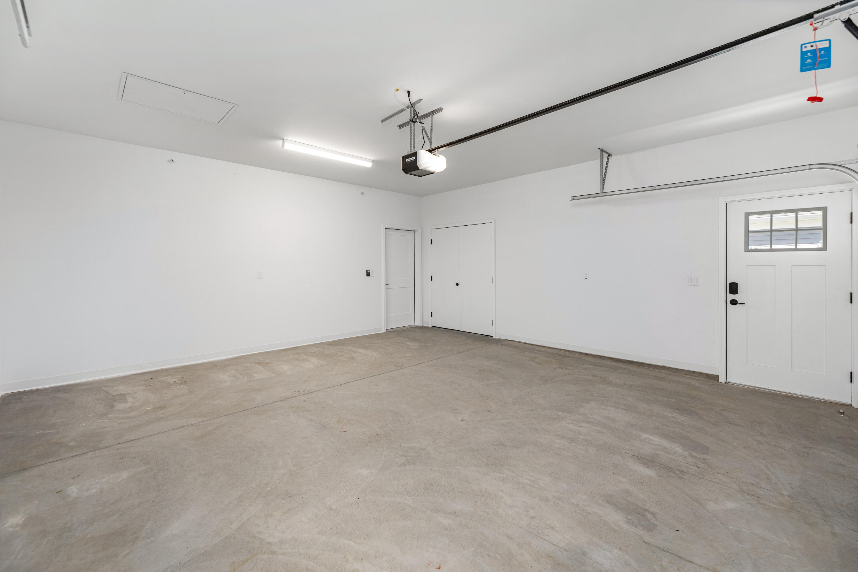 1818 West Mildenhall Drive, Unit 1902 Oak Creek, WI 53154 - Photo 18 of 36 High-speed electric vehicle charging in garage