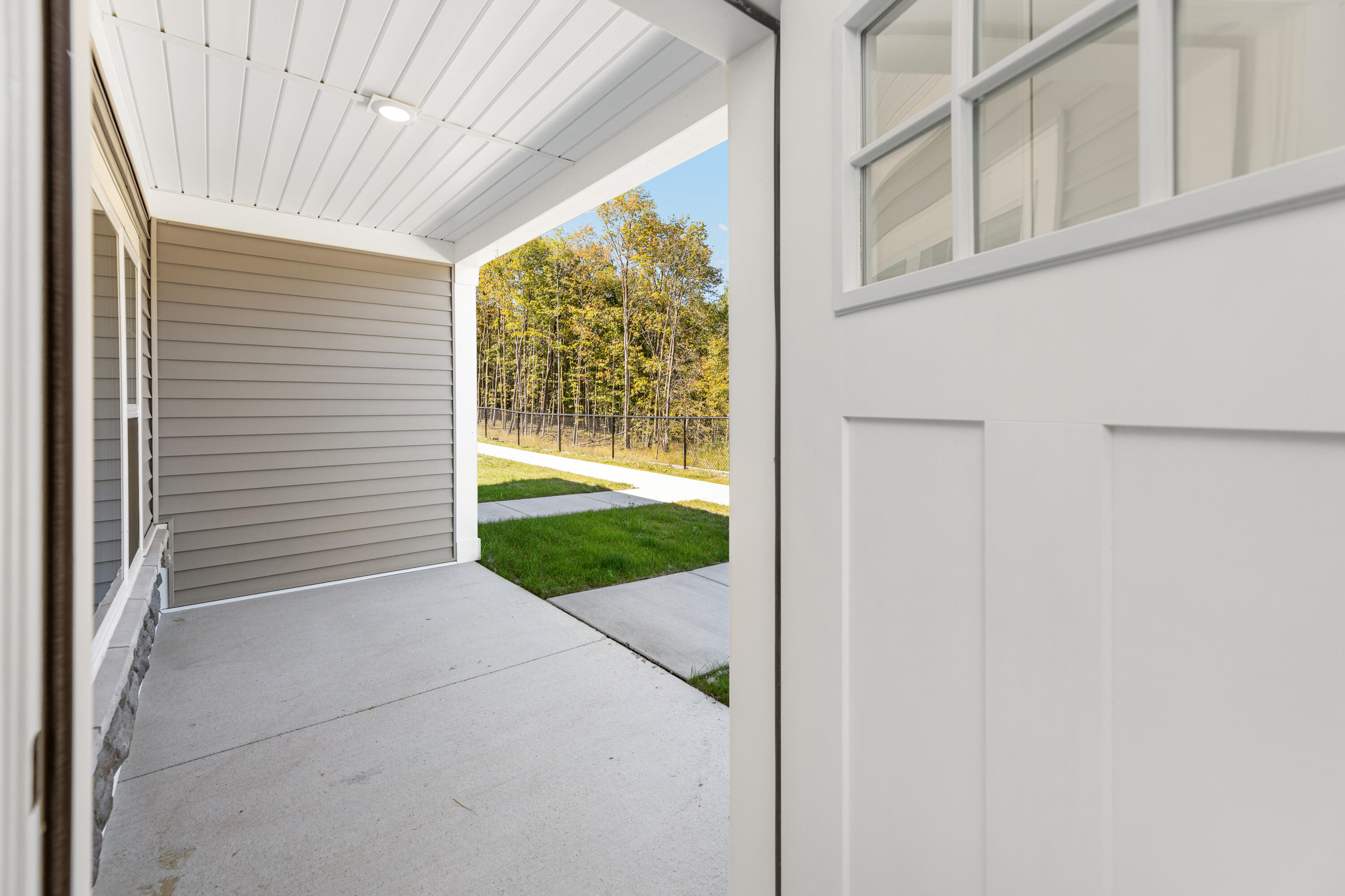 1818 West Mildenhall Drive, Unit 1902 Oak Creek, WI 53154 - Photo 20 of 36 Covered porch