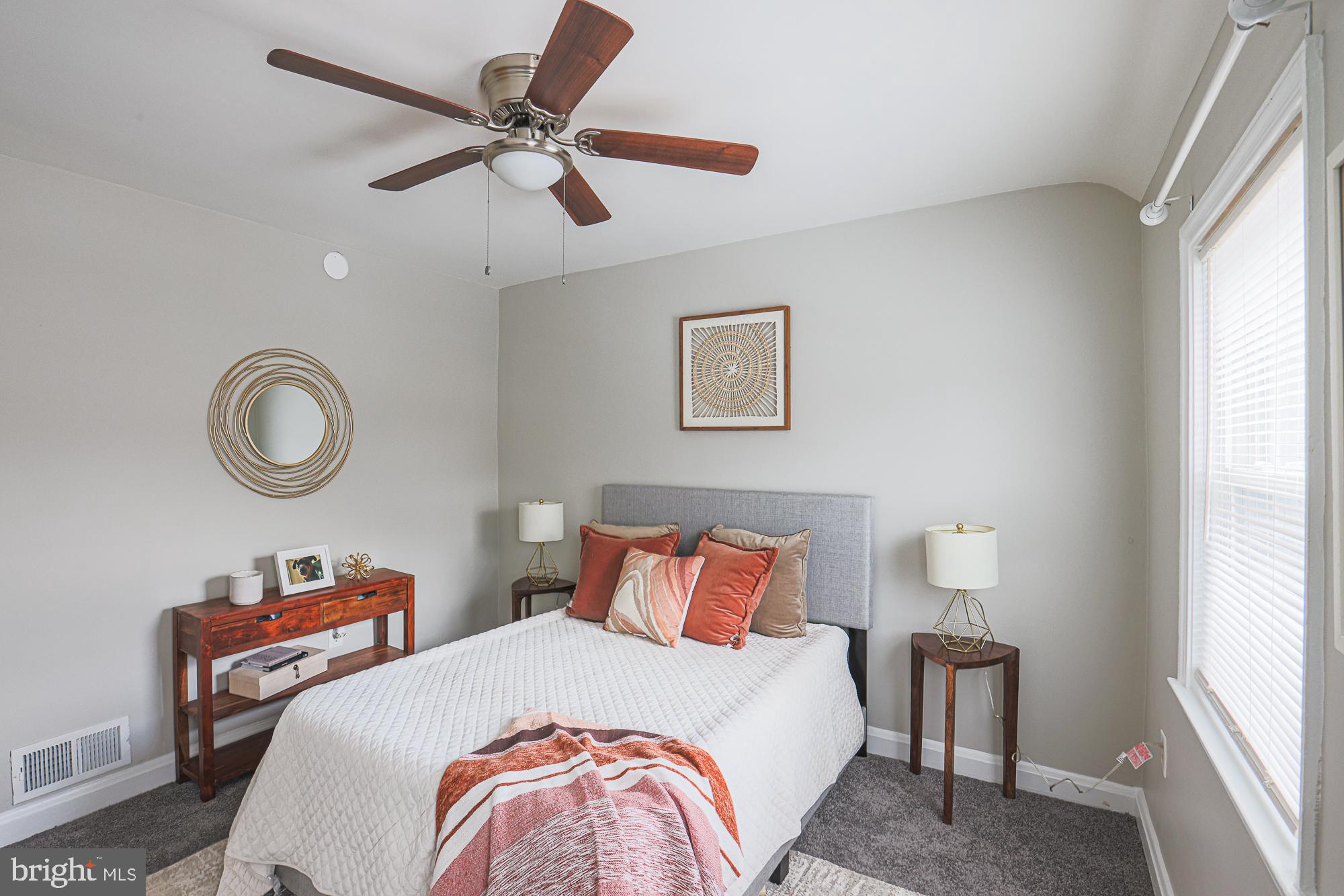 1322 Limit Avenue Baltimore, MD 21239 - Photo 13 of 31 a bedroom with bed and a window