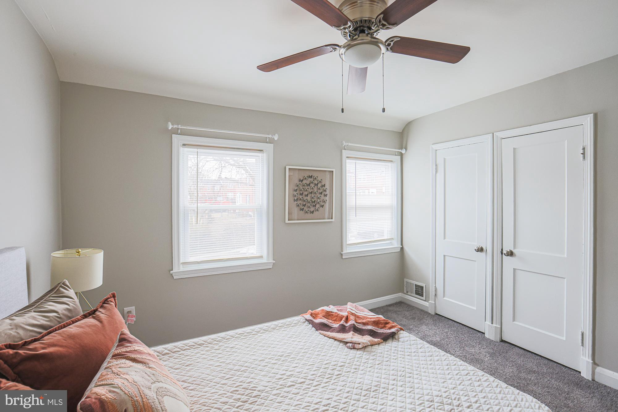 1322 Limit Avenue Baltimore, MD 21239 - Photo 17 of 31 a bedroom with a bed and a window