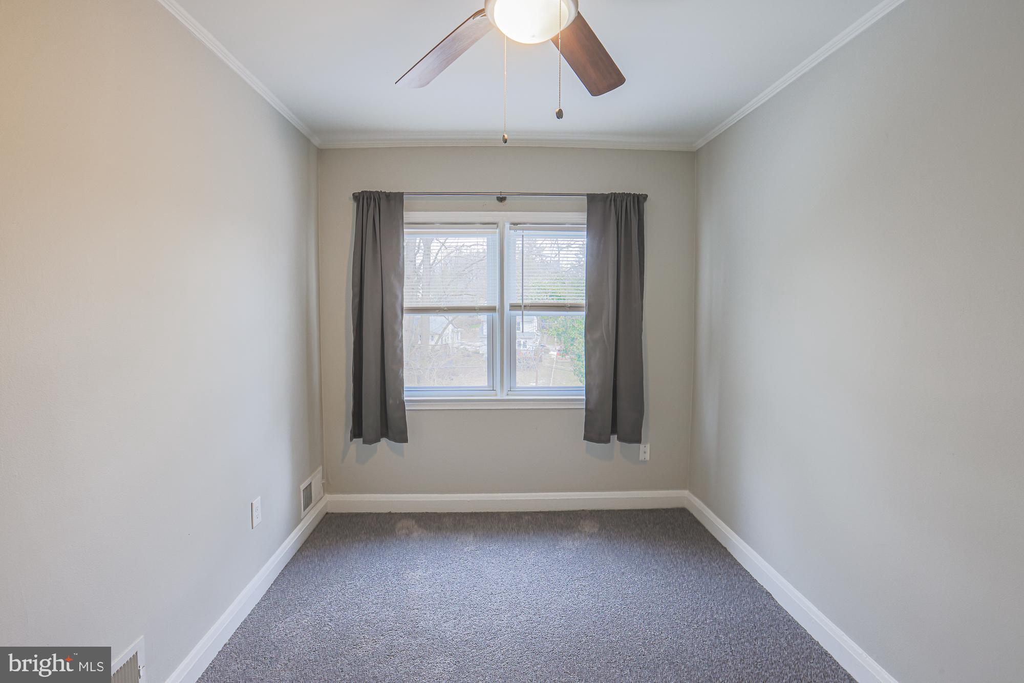 1322 Limit Avenue Baltimore, MD 21239 - Photo 20 of 31 an empty room with a window