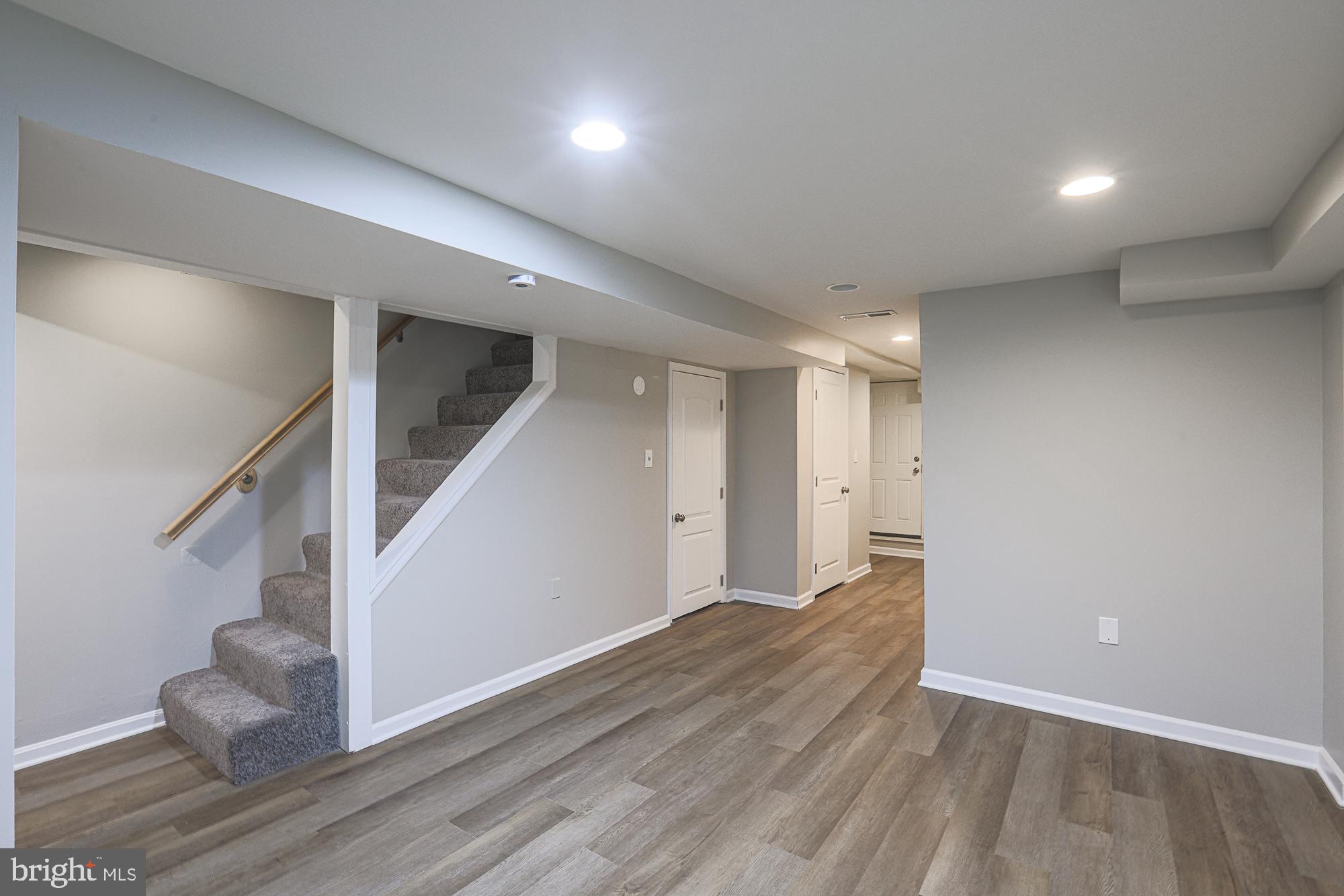 1322 Limit Avenue Baltimore, MD 21239 - Photo 24 of 31 a view of an empty room with wooden floor