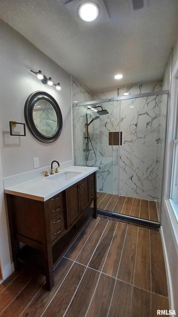 822 6th Avenue South Clinton, IA 52732 - Photo 18 of 28 a bathroom with a sink and a mirror