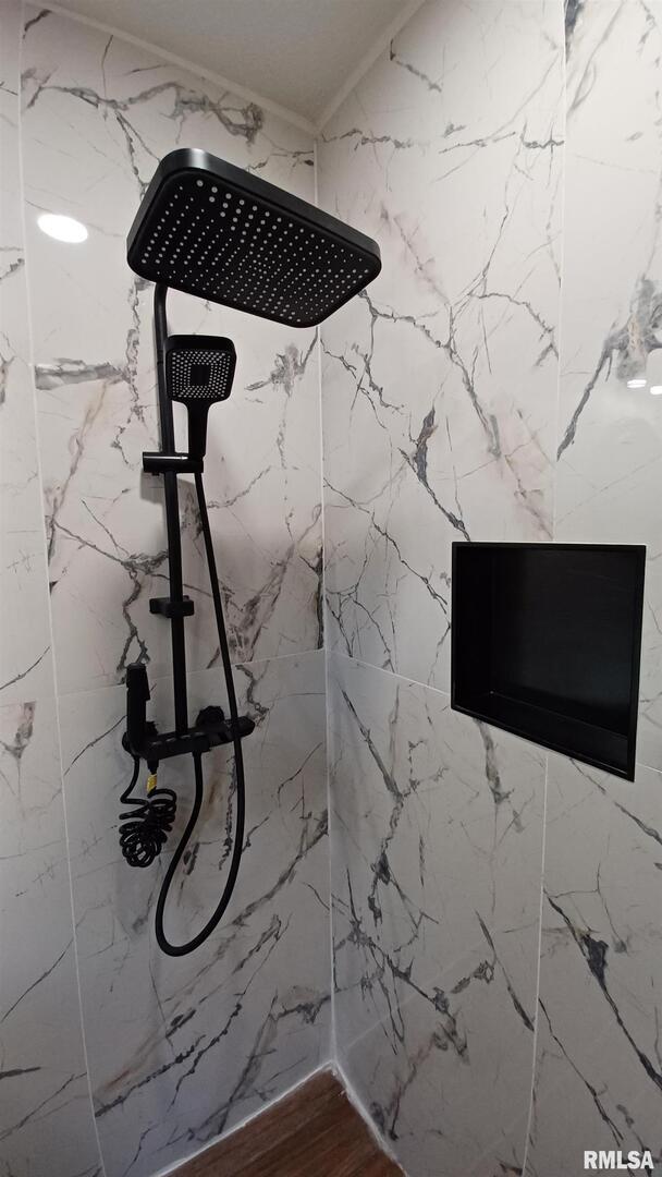 822 6th Avenue South Clinton, IA 52732 - Photo 19 of 28 a bathroom with a shower and mirror