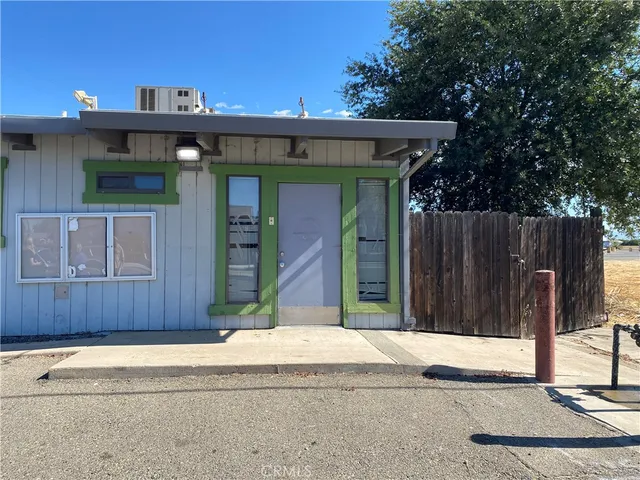 a front view of a house with a garage
