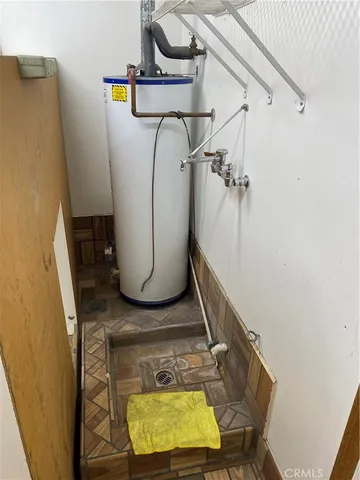 a view of a bathroom with a sink and mirror