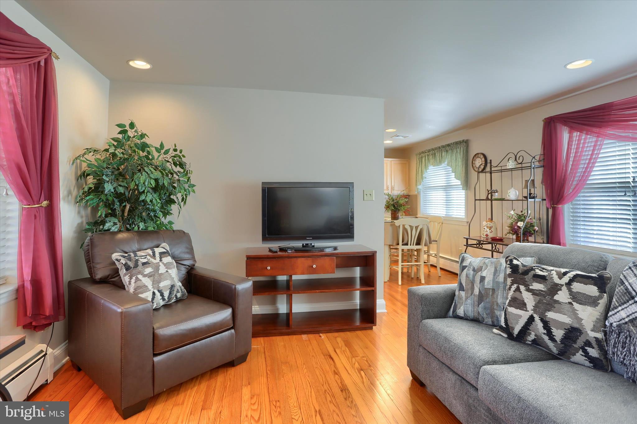 2406 Roundtop Road Middletown, PA 17057 - Photo 13 of 49 a living room with furniture and a flat screen tv