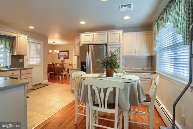a view of a dining room with furniture window and outside view