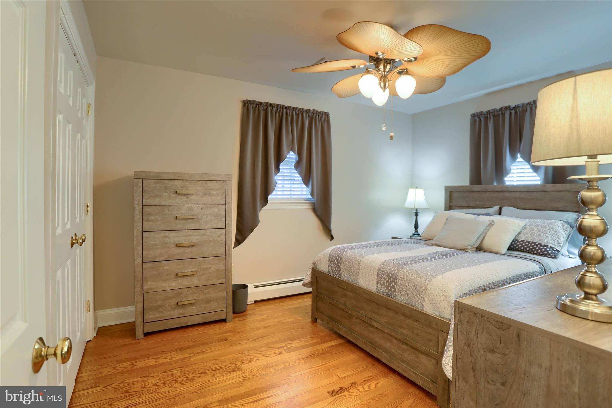 2406 Roundtop Road Middletown, PA 17057 - Photo 30 of 49 a bedroom with a bed chandelier and a window