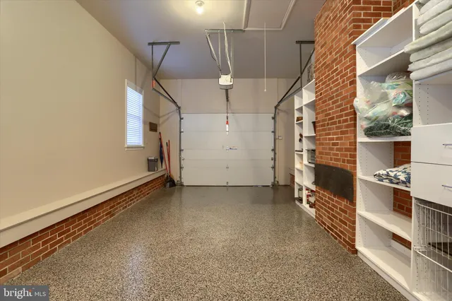 a view of a garage with stairs