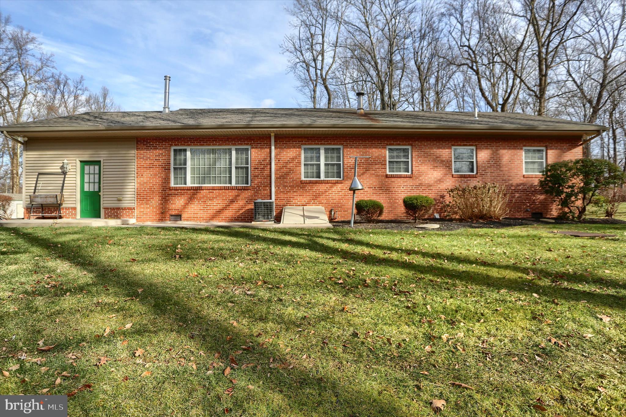 2406 Roundtop Road Middletown, PA 17057 - Photo 43 of 49 a front view of a house with a yard and plants