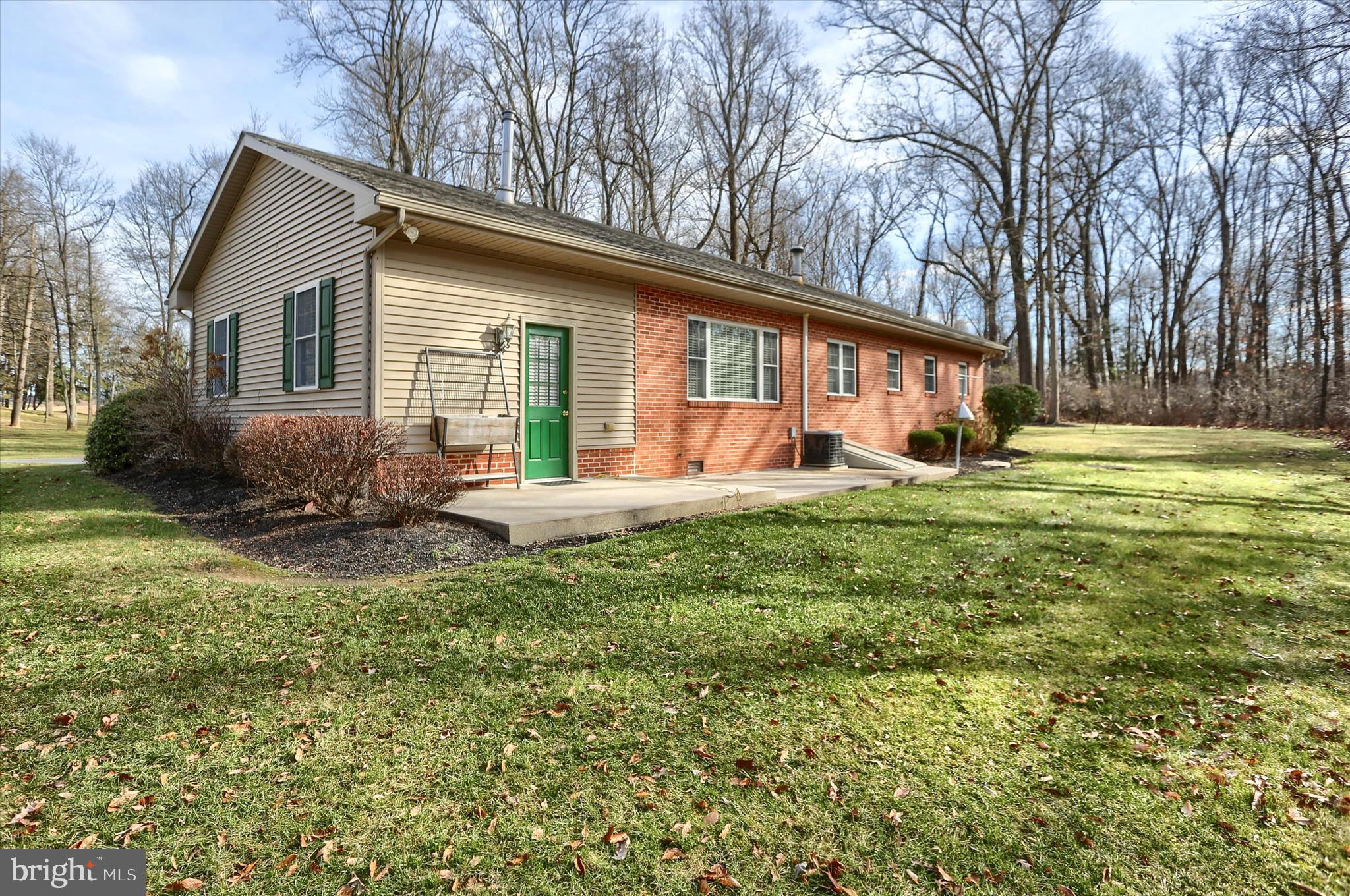 2406 Roundtop Road Middletown, PA 17057 - Photo 44 of 49 a backyard of a house with table and chairs