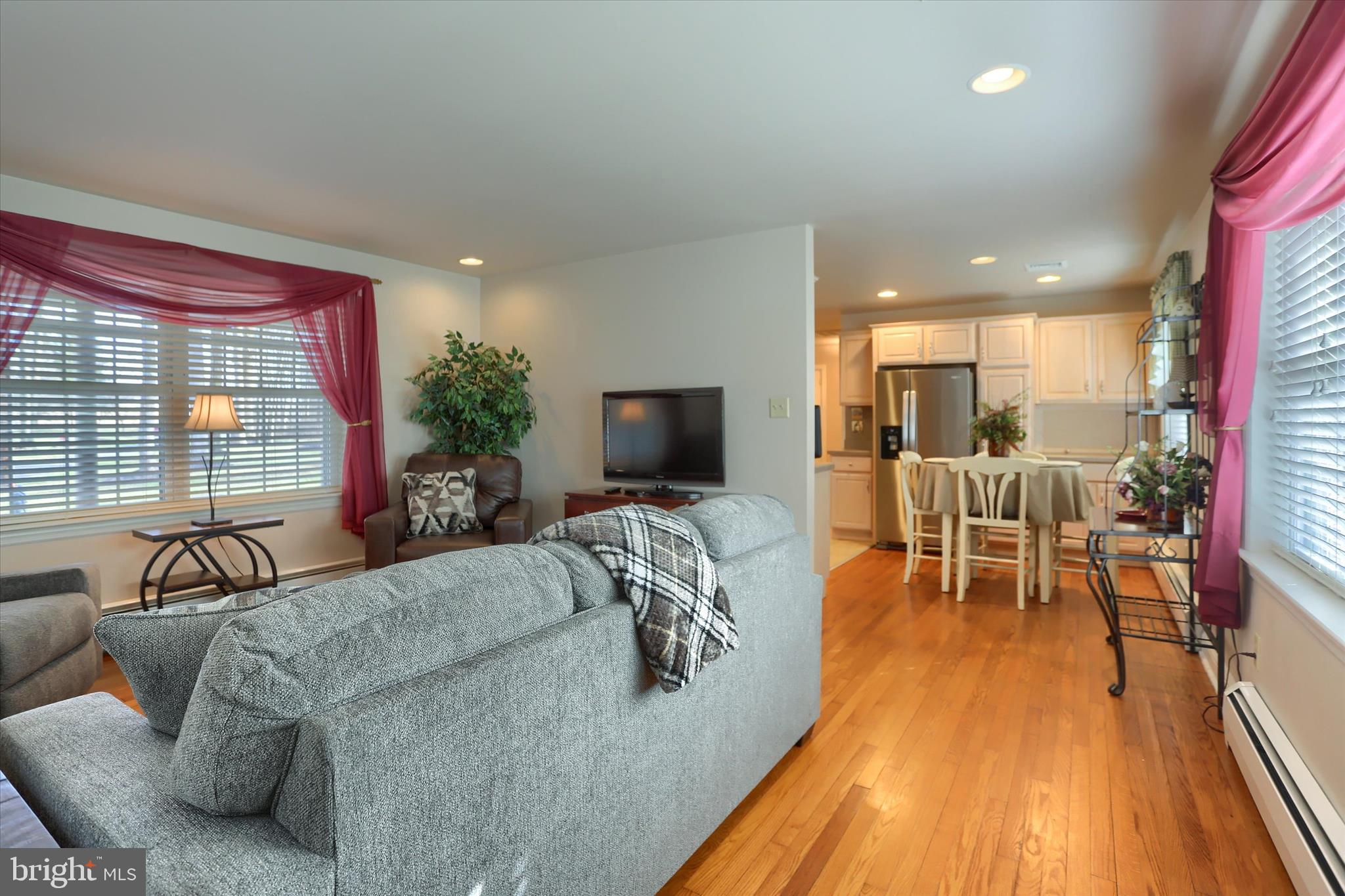 2406 Roundtop Road Middletown, PA 17057 - Photo 9 of 49 a living room with furniture and a flat screen tv