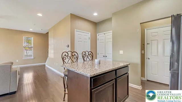 a view of kitchen island wooden floor