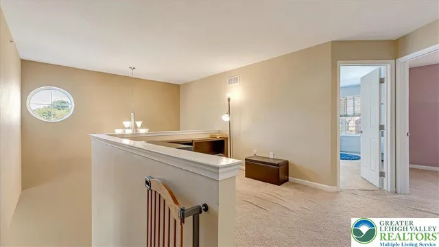 a kitchen with a refrigerator and a stove