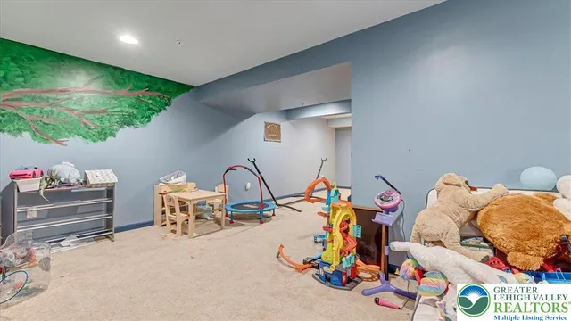 a room with toys and a wooden floor